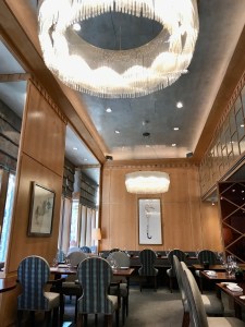 The Dining Room at The Capital Hotel in London featuring the glass chandelier.